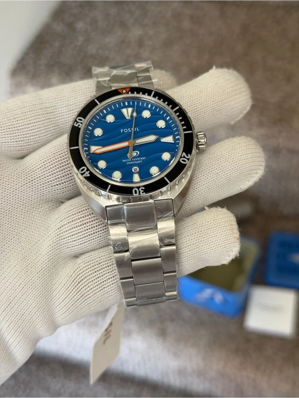 Fossil Men’s Blue Wave Dial Stainless Steel Swim Watch with Black Bezel